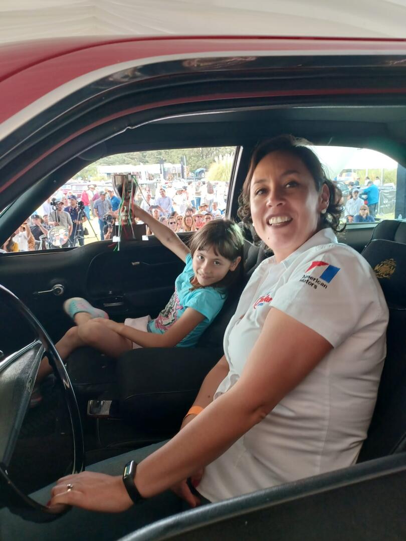 Zaredith Mejia and her daughter Amaia proudly displaying their show trophy